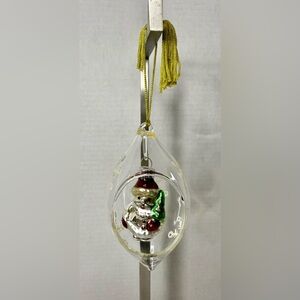 Lenox clear glass ornament t with Santa holding a  Christmas tree hangs about 5"